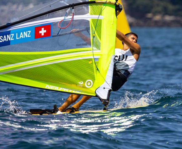 epa09364300 Swiss windsurfer Mateo Sanz Lanz competes in the in the Men&#039;s RS:X Windsurfing discipline of the the Sailing events of the Tokyo 2020 Olympic Games in Enoshima, Japan, 25 July 2021. E ...