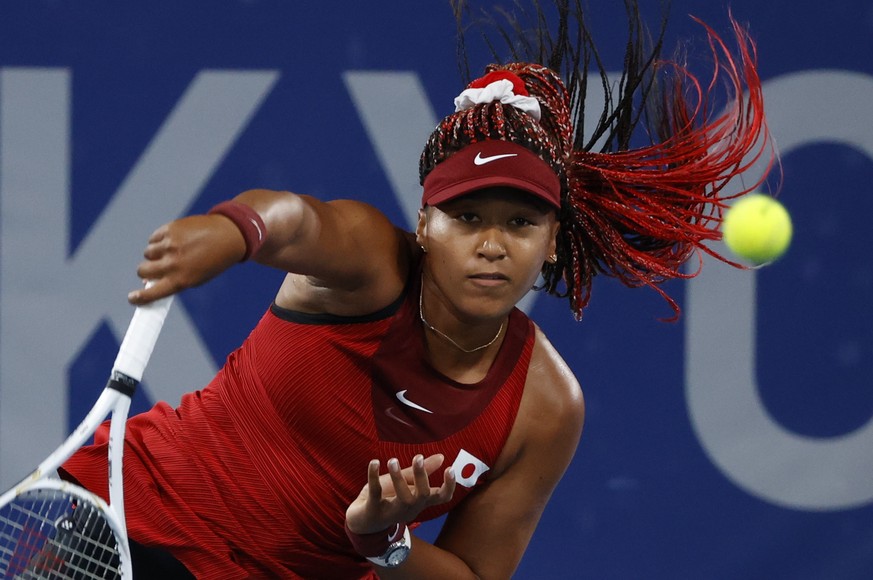 epaselect epa09368920 Naomi Osaka of Japan in action against Marketa Vondrousova of the Czech Republic during the Women&#039;s Singles Third Round Tennis events of the Tokyo 2020 Olympic Games at the  ...