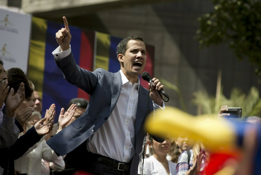 FILE - In this Jan. 11, 2019 file photo, Juan Guaido, president of the Venezuelan National Assembly, delivers a speech during a public legislative session in Caracas, Venezuela. The head of Venezuela& ...