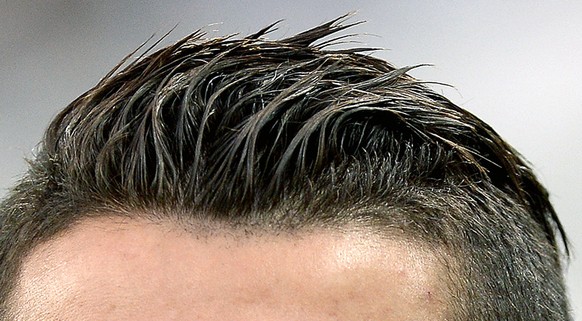 Real Madrid Cristiano Ronaldo winks during a training session ahead of Tuesday's Champions League semifinal first leg soccer match between Juventus and Real Madrid, at Turin's Juventus Stadium, Italy, Monday, May 4, 2015. (AP Photo/Massimo Pinca)