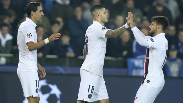 PSG&#039;s Mauro Icardi, center, is congratulated after scoring the opening goal of the match during a Champions League Group A soccer match between Club Brugge and Paris Saint Germain at the Jan Brey ...