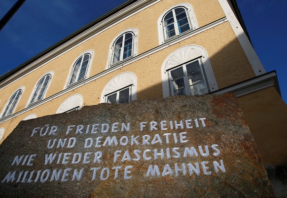A stone outside the house in which Adolf Hitler was born, with the inscription &#039;For peace, freedom and democracy, never again fascism, millions of dead are a warning&#039;, is pictured in Braunau ...