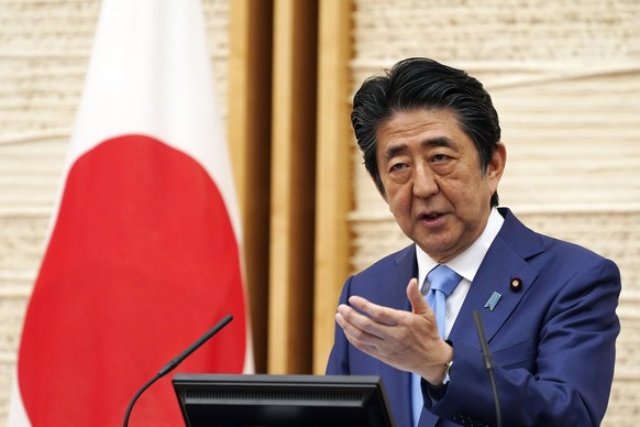 FILE - In this May 4, 2020, file photo, Japan&#039;s Prime Minister Shinzo Abe speaks during a press conference at his official residence in Tokyo. Prime Minister Abe on Monday became Japan&#039;s lon ...