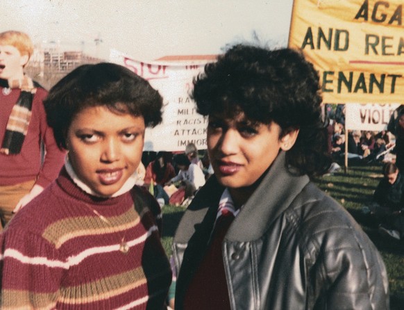 This November 1982 photo provided by the Kamala Harris campaign shows her, right, with Gwen Whitfield at an anti-apartheid protest during her freshman year at Howard University in Washington. (Kamala  ...