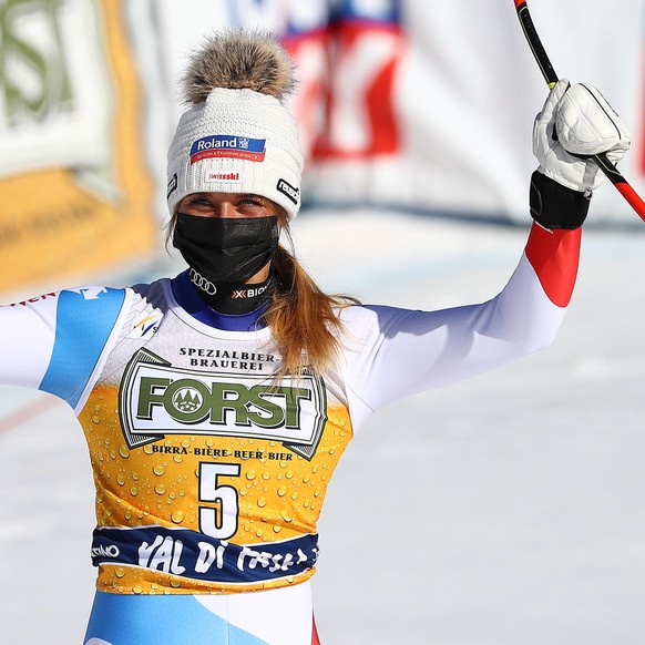 epa09038064 Third placed Corinne Suter of Switzerland in the finish area after the Women&#039;s Downhill race at the FIS Alpine Skiing World Cup in Val di Fassa, Italy, 26 February 2021. EPA/ANDREA SO ...