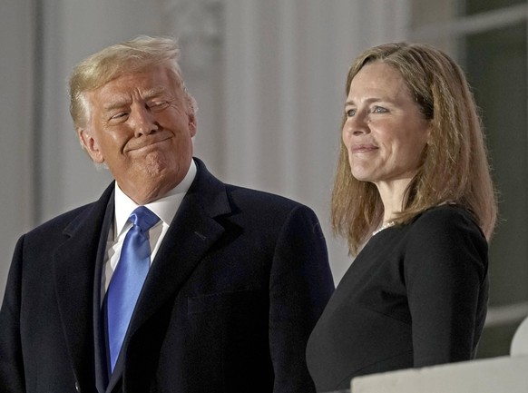 October 26, 2020, Washington, District of Columbia, USA: United States President DONALD J. TRUMP and Justice AMY CONEY BARETT pose for a photo on the Blue Room Balcony of the White House. President Tr ...