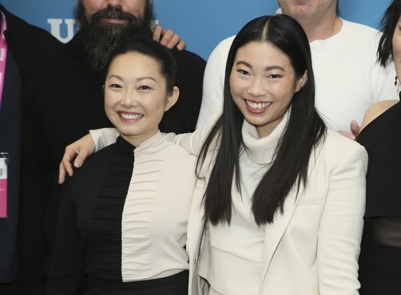 Writer and director Lulu Wang, left, and actress Awkwafina pose at the premiere of &quot;The Farewell&quot; during the 2019 Sundance Film Festival, Friday, Jan. 25, 2019, in Park City, Utah. (Photo by ...