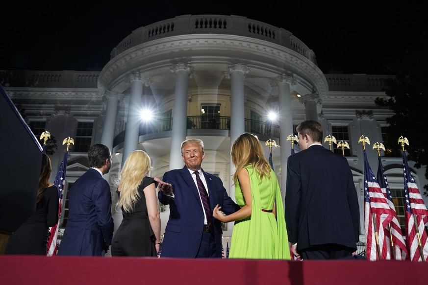 From left, Donald Trump Jr., Tiffany Trump, President Donald Trump, first lady Melania Trump and Barron Trump stand on stage on the South Lawn of the White House on the fourth day of the Republican Na ...