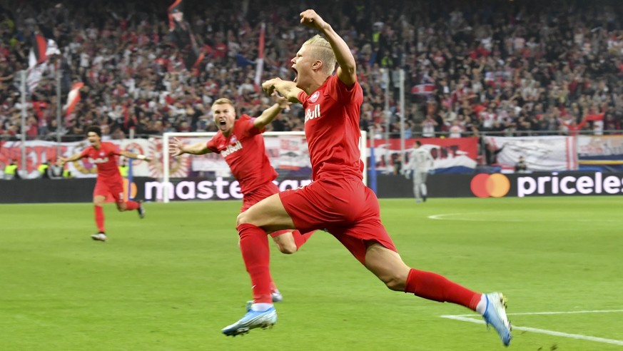 FC Red Bull Salzburg Erling Braut Haland celebrates after scoring against KRC Genk during the Champions League Group E at Red Bull Arena in Salzburg, Austria, Tuesday, Sept. 17, 2019. (AP Photo/Kersti ...