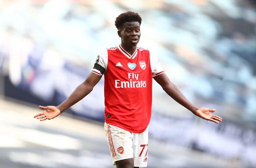 epa08542239 Bukayo Saka of Arsenal reacts during the English Premier League soccer match between Tottenham Hotspur and Arsenal FC in London, Britain, 12 July 2020. EPA/Julian Finney/NMC/Pool EDITORIAL ...