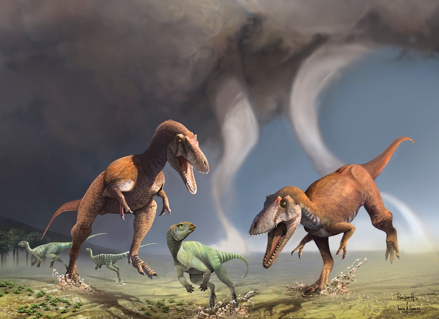 This illustration shows two Cretaceous Period predatory dinosaurs named Gualicho shinyae hunting smaller bipedal herbivorous dinosaurs in northern Patagonia 90 million years ago. Scientists on July 13 ...