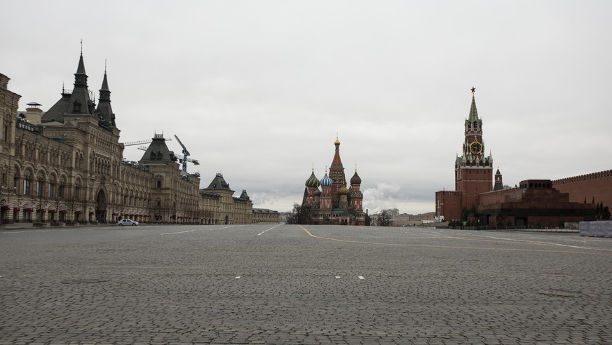 A view of an empty Red square, with the St. Basil&#039;s Cathedral, center, and Kremlin&#039;s Spasskaya Tower, right, in Moscow, Russia, Monday, March 30, 2020. Moscow Mayor Sergei Sobyanin ordered a ...