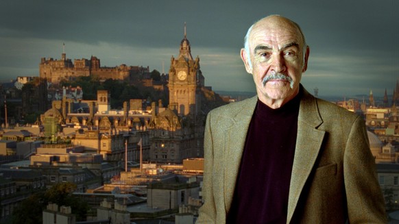 August 2008 photo released by Visit Scotland Friday Jan. 23, 2009 showing former James Bond actor Sean Connery against a backdrop of Edinburgh Castle in Edinburgh, Scotland. The photo is part of a &qu ...