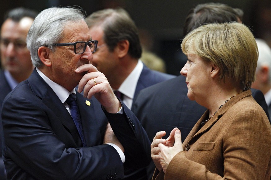EU-Kommissionspräsident Jean-Claude Juncker mit der deutschen Bundeskanzlerin Angela Merkel.&nbsp;
