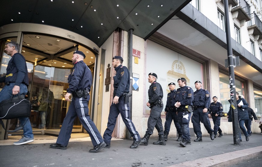 epa08247223 Policemen arrive at a hotel, where one of the women who were tested positive on the Covid-19 Corona virus works, in Innsbruck, Austria, 25 February 2020. Two 24 years old Italians were tes ...