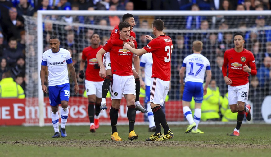 Manchester United&#039;s Harry Maguire celebrates scoring against Tranmere Rovers during the English FA Cup fourth round soccer match at Prenton Park, Birkenhead, England, Sunday Jan. 26, 2020. (Simon ...