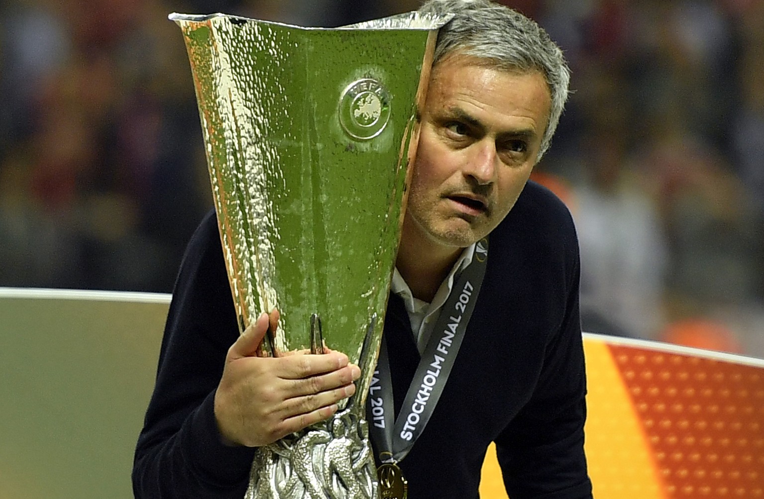United manager Jose Mourinho poses with the trophy after winning the soccer Europa League final between Ajax Amsterdam and Manchester United at the Friends Arena in Stockholm, Sweden, Wednesday, May 2 ...