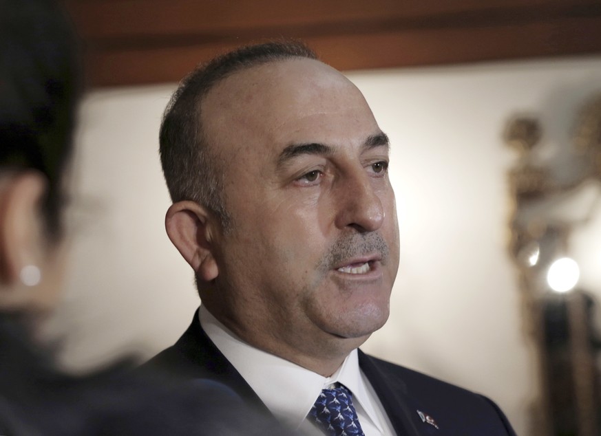 Turkey&#039;s Foreign Minister Mevlut Cavusoglu speaks to the media in Ankara, Turkey, Friday, March 3, 2017. Cavusoglu says a &quot;deep state&quot; in Germany is working to prevent Turkish leaders f ...