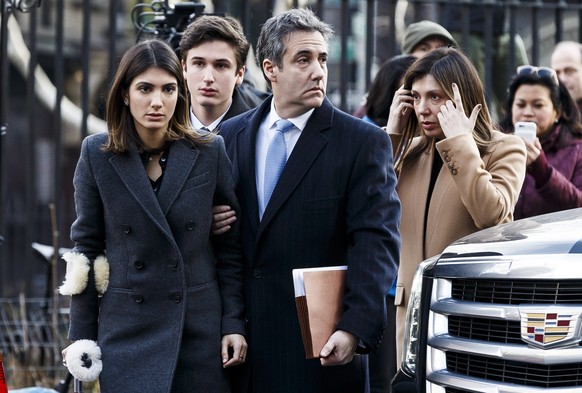 epa07226156 Michael Cohen (C), President Trump&#039;s former lawyer, arrives with his family for his sentencing hearing at United States Federal Court in New York, New York, USA, 12 December 2018. EPA ...