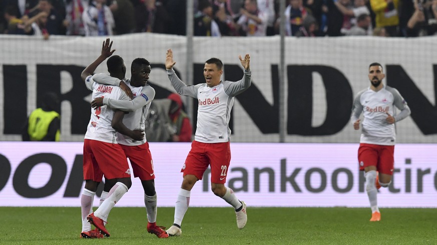Salzburg&#039;s Amadou Haidara, second left, celebrates with his teammates after scoring his side&#039;s opening goal during the Europa League second leg semifinal soccer match between Salzburg and Ma ...