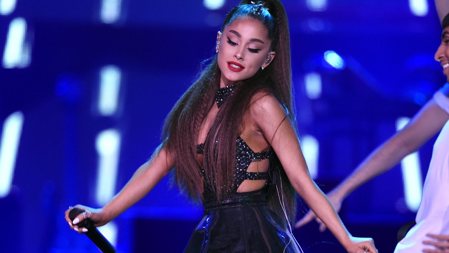 FILE - In this June 2, 2018 file photo., Ariana Grande performs at Wango Tango at Banc of California Stadium in Los Angeles. Grande is returning to Manchester, two years after a suicide bomber killed  ...