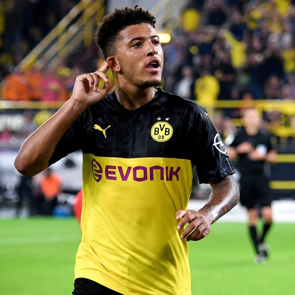 epa07755442 Dortmund&#039;s Jadon Sancho celebrates after scoring the 2-0 lead during the German Supercup soccer match between Borussia Dortmund and FC Bayern Muenchen in Dortmund, Germany, 03 August  ...