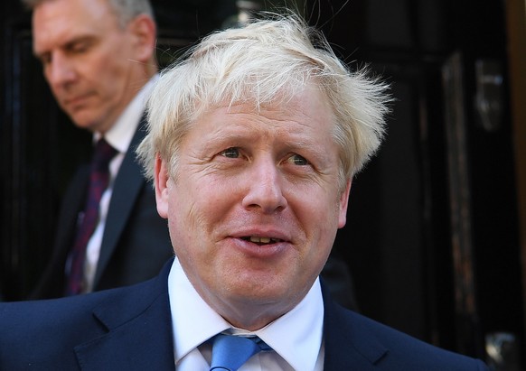 epa07735412 Conservative party leader Boris Johnson departs to his office after he was announced as the new Conservative party leader at an event in London, Britain, 23 July 2019. Former London mayor  ...