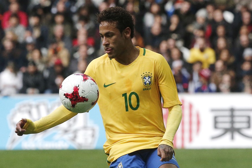 FILE - In this Friday, Nov. 10, 2017 filer, Brazil&#039;s Neymar controls the ball during the international friendly soccer match between Brazil and Japan at the Pierre Mauroy stadium in Lille, northe ...
