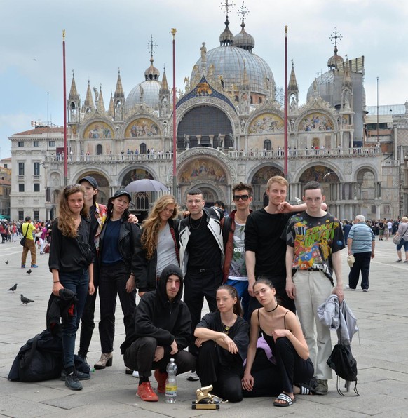 The performers team of &#039;Faust&#039;, by German artist Anne Imhof, winner of the Golden Lion for Best National Pavillion award at the 57th Venice Biennale contemporary art show, pose in St. Mark&# ...