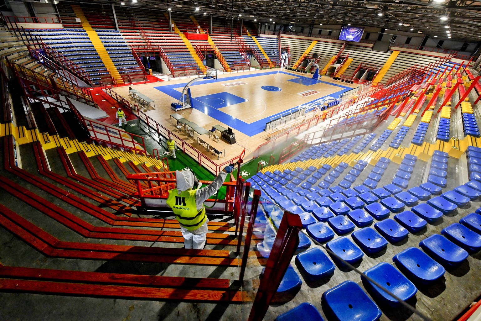 epaselect epa08266699 Operators of Naples Services sanitize the sports facility of Palabarbuto to counteract the danger of contagion from Coronavirus, Naples, Italy, 03 March 2020. Italy reported the  ...