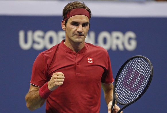 Roger Federer, of Switzerland, celebrates after defeating Yoshihito Nishioka, of Japan, during the first round of the U.S. Open tennis tournament, Tuesday, Aug. 28, 2018, in New York. (AP Photo/Adam H ...