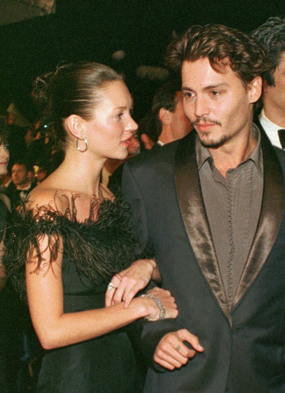 Johnny Depp arrives with supermodel Kate Moss at the Festival Palace in Cannes to attend the screening of Depp&#039;s latest movie May 15, 1998. Depp says in an interview Friday, Nov. 11, 2005, with a ...