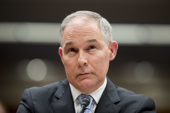 In this May 16, 2018 photo, Environmental Protection Agency Administrator Scott Pruitt appears before a Senate Appropriations subcommittee on the Interior, Environment, and Related Agencies on budget  ...
