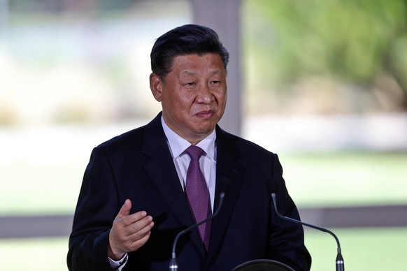 epa07204033 Chinese President Xi Jinping speaks at a press conference after a bilateral meeting with Argentinian President Mauricio Macri (not seen) at the Quinta de Olivos official residence in Bueno ...