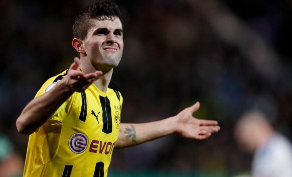 epa05848358 Dortmund&#039;s Christian Pulisic celebrates after scoring the 1-0 lead during the German DFB Cup quarter final soccer match between Sportfreunde Lotte and Borussia Dortmund, in Osnabrueck ...