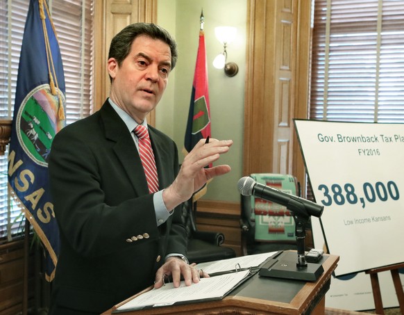 Gov. Sam Brownback meets with the media on Saturday, May 30, 2015 in Topeka, Kan. Brownback is proposing a state sales tax increase and other measures to deal with the state&#039;s projected budget sh ...