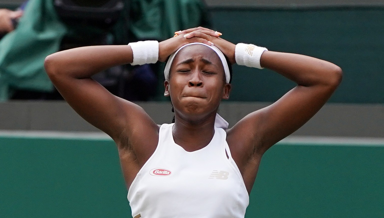 epaselect epa07688162 Cori Gauff of the US celebrates her match point winner against compatriot Venus Williams in their first round match during the Wimbledon Championships at the All England Lawn Ten ...
