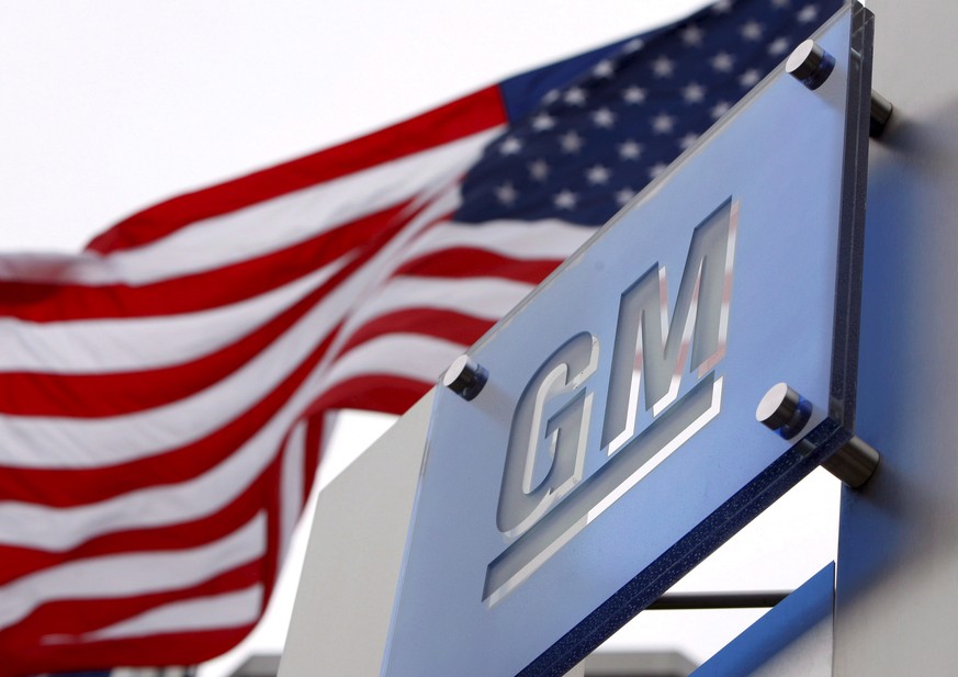 epa09000619 (FILE) - A file picture dated 19 November 2008 shows flags flying outside the General Motors world headquarters in the Renaissance Center in Detroit, Michigan, USA (reissued 10 February 20 ...