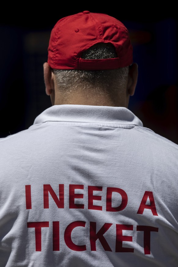 A Liverpool supporter wearing an ¨I need a ticket¨ sweater roams around Puerta del Sol square in downtown, Madrid, Spain, Thursday, May 30, 2019. Liverpool and Tottenham were each allocated nearly 17, ...