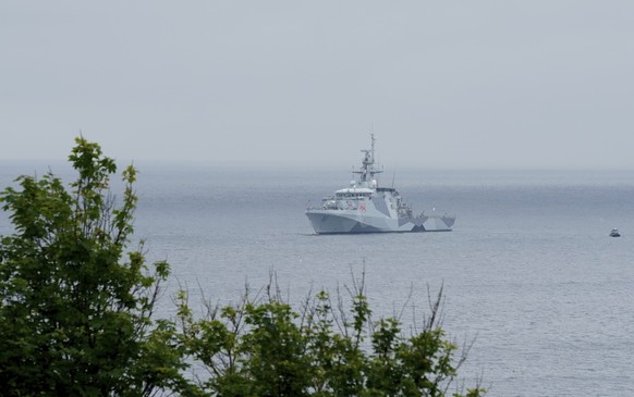 A Royal Navy ship patrols in Carbis Bay, St. Ives, Cornwall, England, Wednesday, June 9, 2021. Security in the area is being tightened ahead of the upcoming G7 meeting taking place in Carbis Bay. G7 l ...