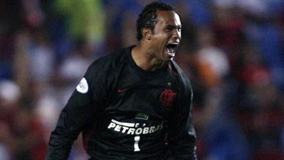 epa02237802 File picture dated 23 April 2008 shows Bruno Fernandes, goalkeeper of Brazilian team Flamengo de Rio, as he celebrates a goal against Peruvian team Coronel Bolognesi during their 2008 Libe ...