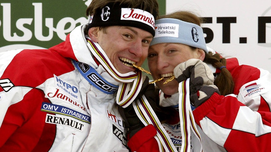 ST. MORITZ, SWITZERLAND - FEBRUARY 16: Ivica and Janica Kostelic of Croatia celebrates Ivica&#039;s 1st place finish in the Men&#039;s Slalom during the 2003 FIS World Championships on February 16, 20 ...