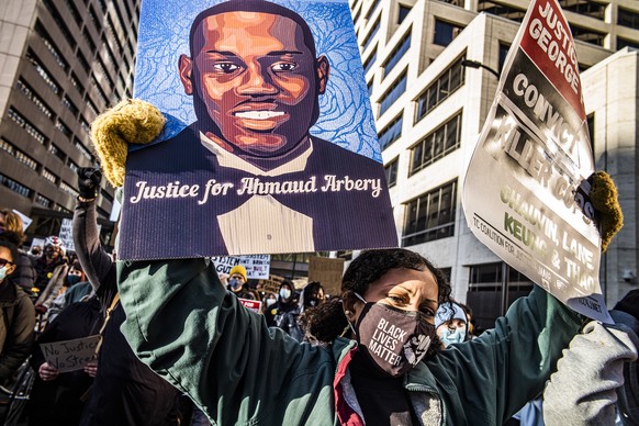 Protesters march downtown in Minneapolis, Minn., on the first day of the Derek Chauvin trial which began with jury selection, Monday, March 8, 2021. (Richard Tsong-Taatarii/Star Tribune via AP)