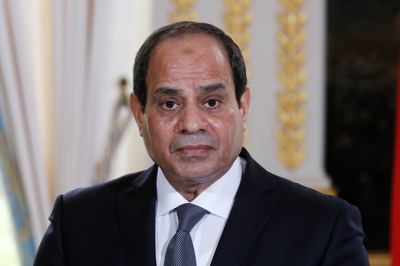 epa06286557 Egyptian President Abdel Fattah al-Sisi attends a news conference with French President Emmanuel Macron (not pictured) at the Elysee Palace, in Paris, France, 24 October 2017. Al Sisi is i ...