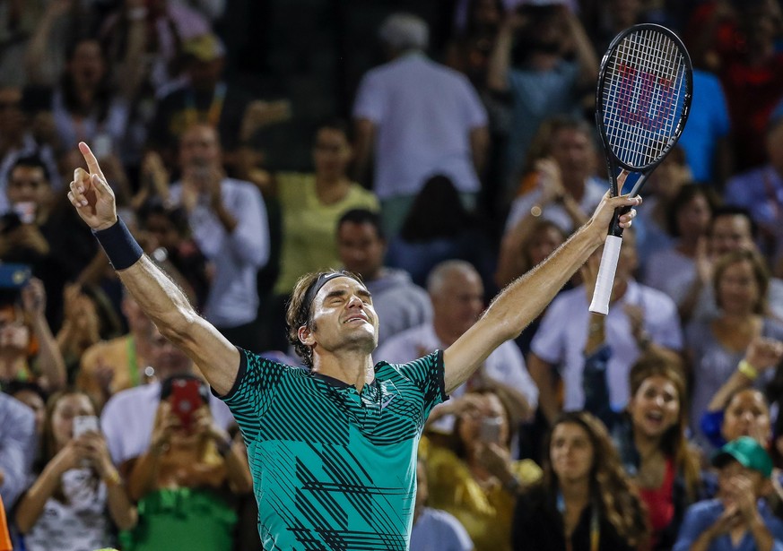 epaselect epa05881959 Roger Federer of Switzerland reacts after defeating Nick Kyrgios of Australia during a semifinal round match at the Miami Open tennis tournament on Key Biscayne, Miami, Florida,  ...