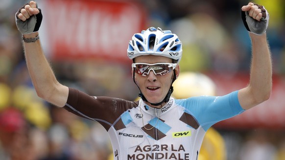 epa05436840 AG2R La Mondiale team rider Romain Bardet of France celebrates as he crosses the finish line to win the 19th stage of the 103rd edition of the Tour de France cycling race over 146Km betwee ...