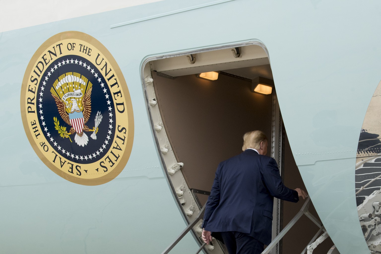 President Donald Trump boards Air Force One at Andrews Air Force Base, Md., Thursday, Oct. 17, 2019, to travel to Fort Worth, Texas. (AP Photo/Andrew Harnik)
Donald Trump