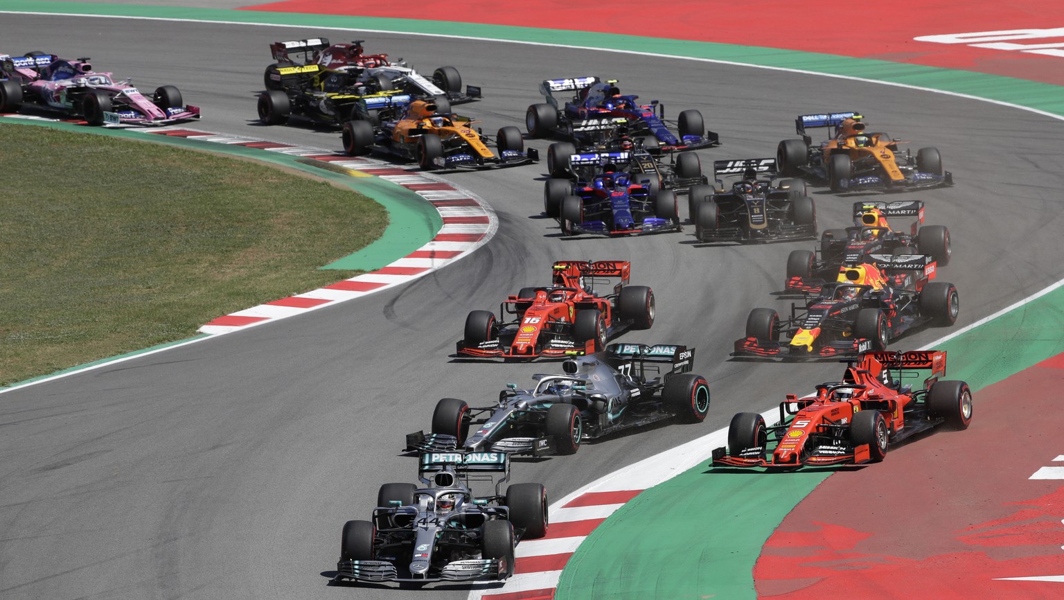 Mercedes driver Lewis Hamilton of Britain leads the field after the start during the Spanish Formula One race at the Barcelona Catalunya racetrack in Montmelo, just outside Barcelona, Spain, Sunday, M ...