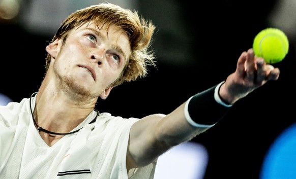 epa05727151 Andrey Rublev of Russia in action against Andy Murray of Britain during their men&#039;s Singles second round match at the Australian Open Grand Slam tennis tournament in Melbourne, Austra ...