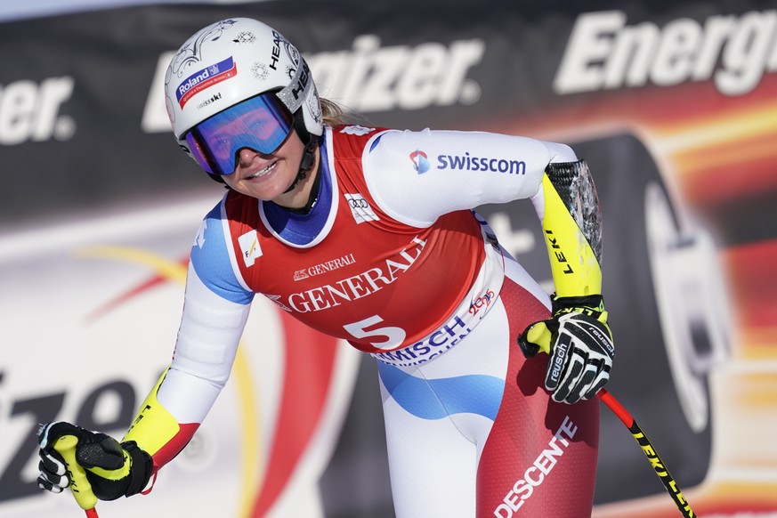 Switzerland&#039;s Corinne Suter reacts in the finish area of an alpine ski, women&#039;s World Cup super G, in Garmish Partenkirchen, Germany, Sunday, Feb. 9, 2020. (AP Photo/Giovanni Auletta)